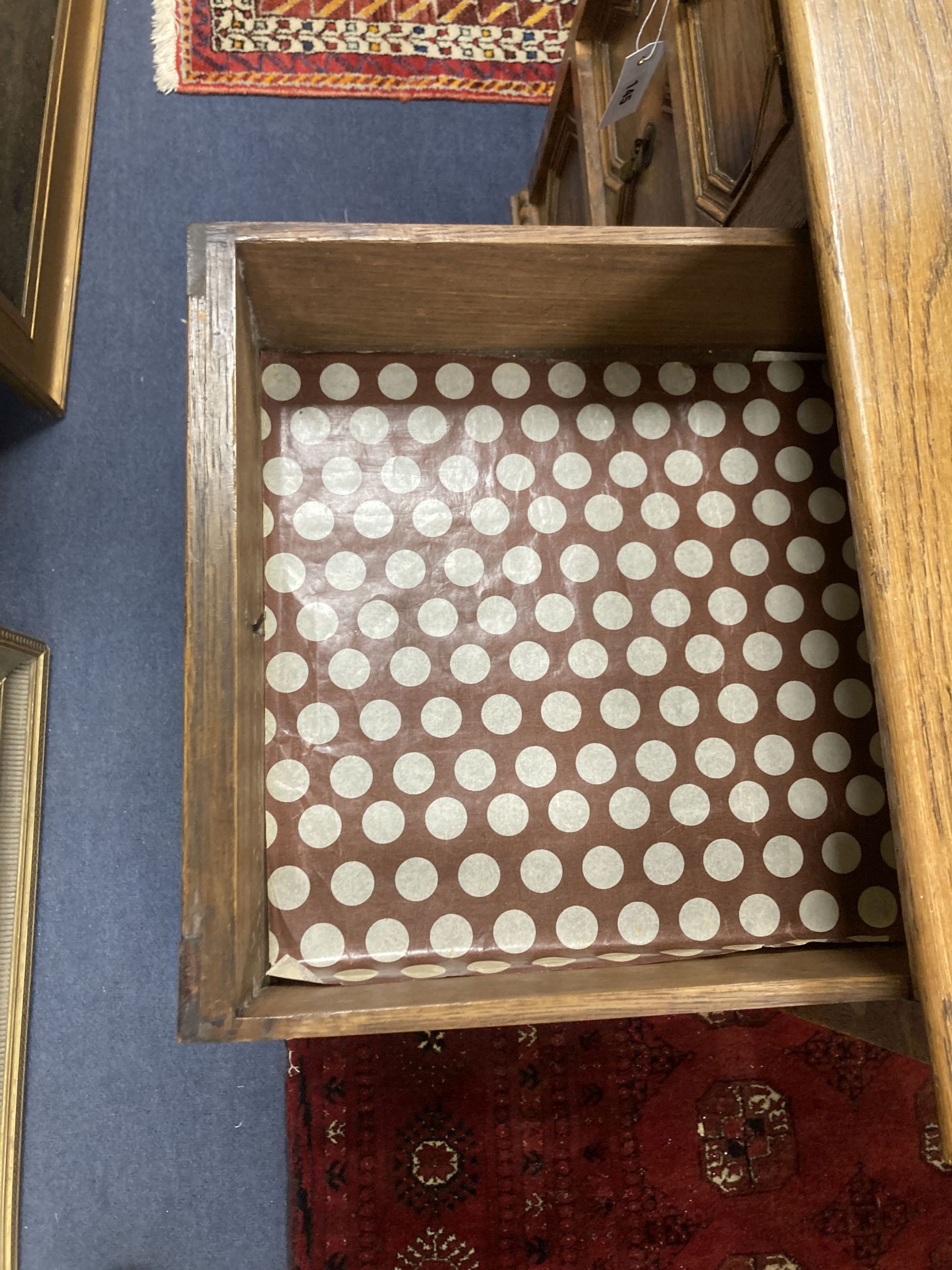 An early 20th century Jacobean style oak four drawer chest, width 81cm, depth 46cm, height 76cm